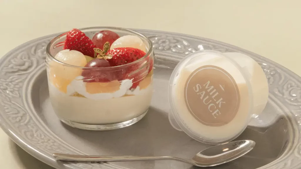 milky fruit dan almond pudding dengan milk sauce