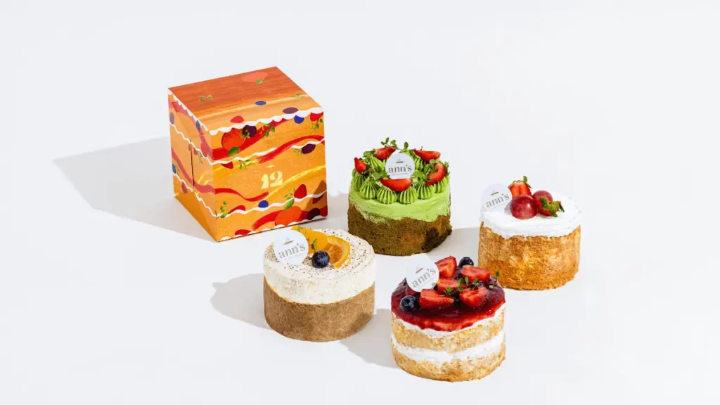 4 mini tres leches cake creations with anniversary box design