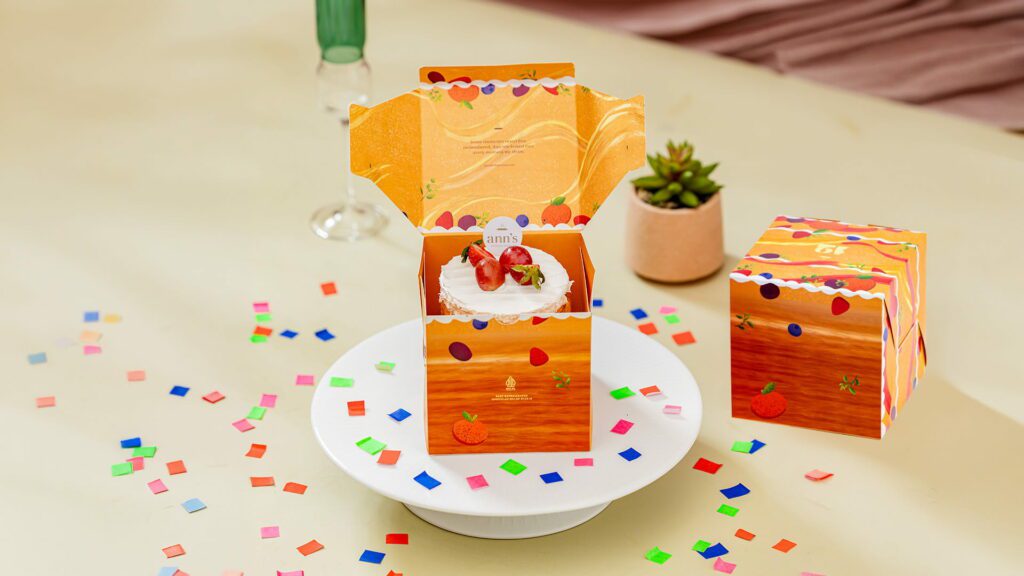 packaging kotak kue berwarna orange